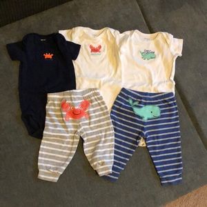Carter’s 5 piece onesie pant set with a crab and a whale 6 mths